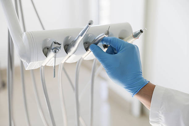 Professional Tooth Extraction technician working in Miami, OK